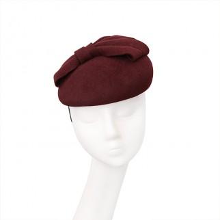 Mini pill-box with a bow