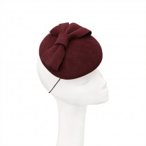 Mini pill-box with a bow