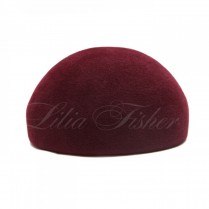 A felt beret with a pompon