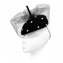 Asymmetrical polka-dot beret with a veil and an "antenna"
