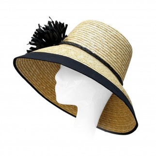 "Ellen" wide-brimmed straw hat with a raffia bow
