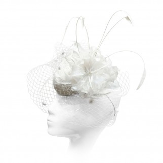 Velour pillbox hat with a feather flower and a veil