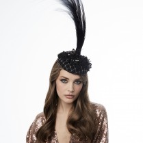 Pill-box hat with feathers and embroidery