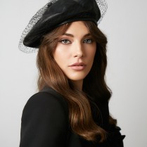Leather beret with a veil