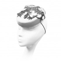 Pill-box hat with couture embroidery and bow